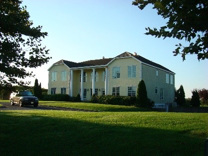 high drama in a private enclave the style and desirability of pheasant close is home to this stucco classic.