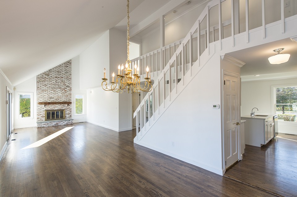 view from dining area into the kitchen and the rest of the great room