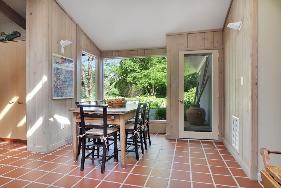 a charming breakfast room looking out over the gardens