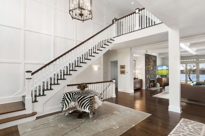 dramatic entryway opens to greatroom