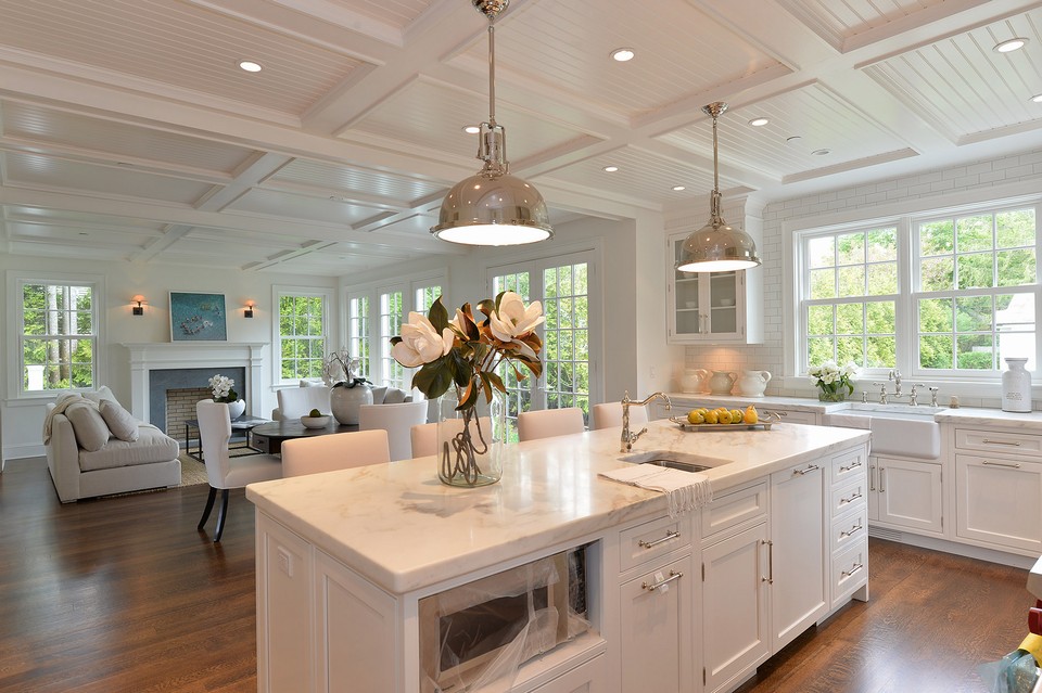 kitchen into family room large space and lots of light is the theme here.