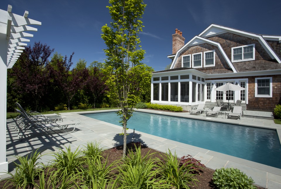rear view of house with pool