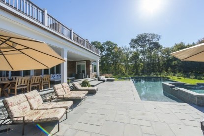 infinity edge pool and outdoor lounge