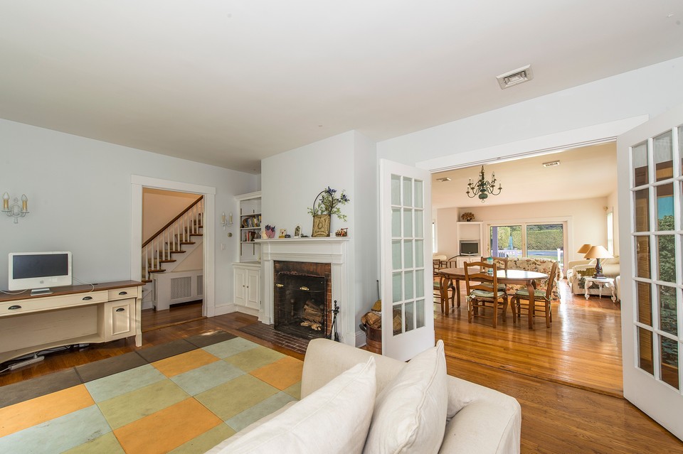 front living room opens to the dining area and family room the bones of this lovely 1920's house give it a dignified air and offers a genuine glimpse into the history of southampton village and how it appeared back in the 20's!