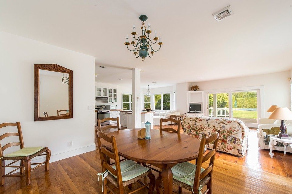 open floor plan gives a light and spacious feeling to the whole main floor the main floor is made up of living room, kitchen, powder room, entry hall, family room and dining area.